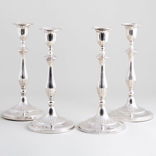 Group of Four George III Silver Candlesticks