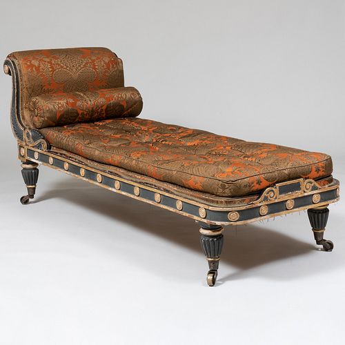 English Regency Carved, Ebonized and Parcel-Gilt Upholstered Chaise Lounge