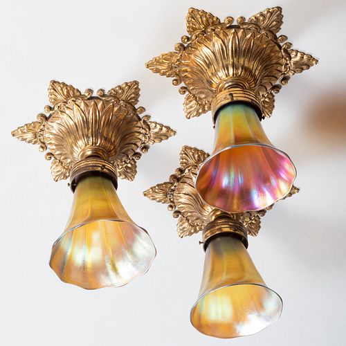 Set of Three Favrile Glass Shades and Gilt-Metal Appliques