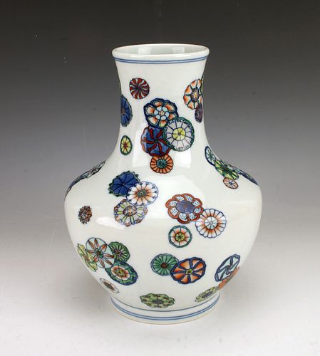 VASE WITH CIRCULAR FLORAL MEDALLIONS