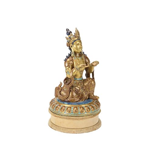 A CHINESE GILT GLAZED PORCELAIN KNEELING BODHISATTVA WITH STAND, 18TH CENTURY 