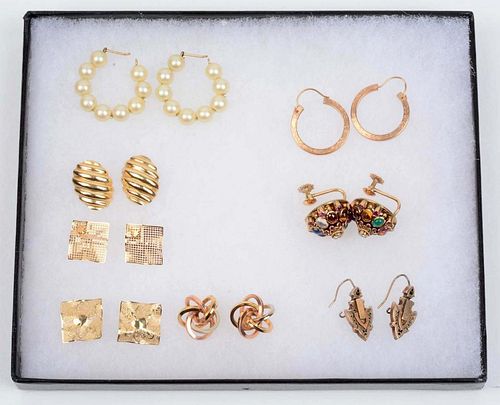 8 Pairs Of 14K Gold Earrings.