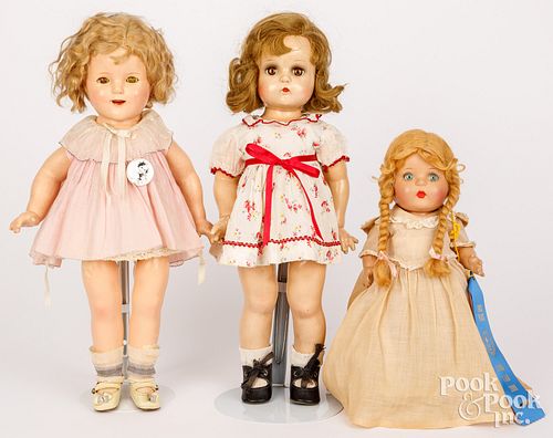 Three composition dolls
