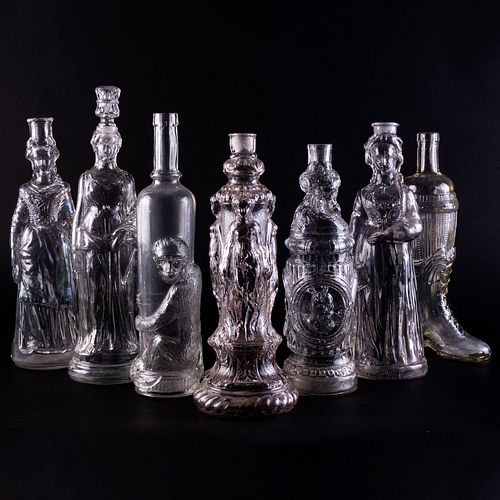 Group of Seven Figural Glass Bottles