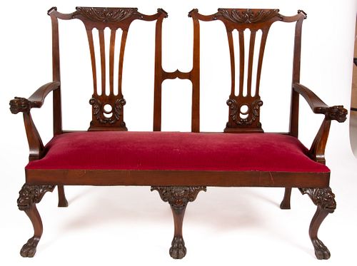 CHIPPENDALE-STYLE CARVED MAHOGANY SETTEE