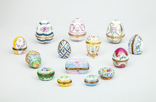 Group of Thirteen Limoges Porcelain Egg-Form Boxes and a Halcyon Days Enamel Box