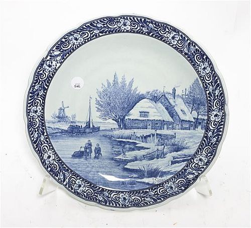 A Delft Ceramic Charger, Diameter 15 3/4 inches.