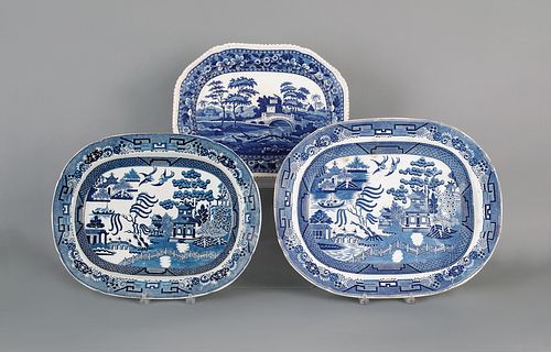 Two blue willow platters, 19th c., 16 1/2" l., 21"