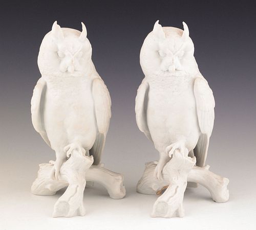 Pair of Kaiser white bisque owls, 9 1/4" h.