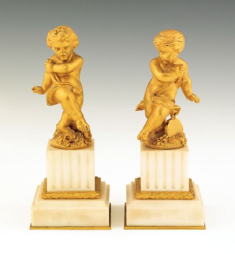 Pair of ormolu and alabaster putti figures, 6 3/4"
