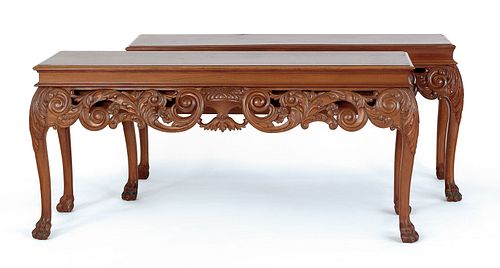 Pair of French carved mahogany consoles, the backs