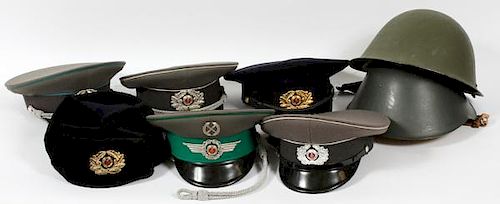 COLLECTION OF EAST-GERMAN OFFICER HATS, ACCESSORIES