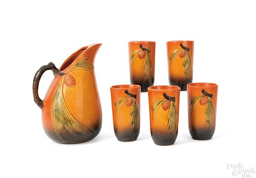 Six-piece Roseville pottery pine cone lemonade set