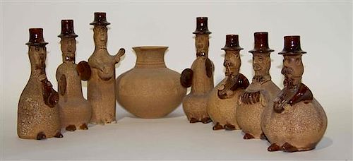 A Group of Seven Haeger Pottery Stoneware Toe Tappers Height of tallest 12 1/4 inches.