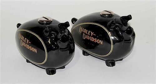 A Pair of Haeger Pottery Piggy Banks Height of tallest 7 1/4 inches.