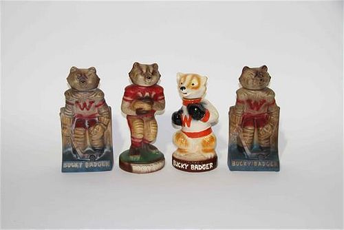 A Group of Four Haeger Pottery Figural Bottles Height of tallest 11 3/4 inches.