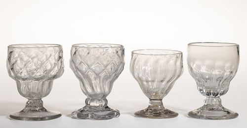 PATTERN-MOLDED GLASS FOOTED OPEN SALTS, LOT OF FOUR
