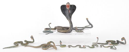 Eleven Austrian cold painted bronze snakes, mid 20