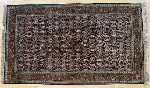 Three oriental carpets, mid 20th c., and later, 8'