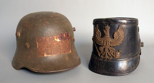 German WWI helmet, together with a German WWII hel