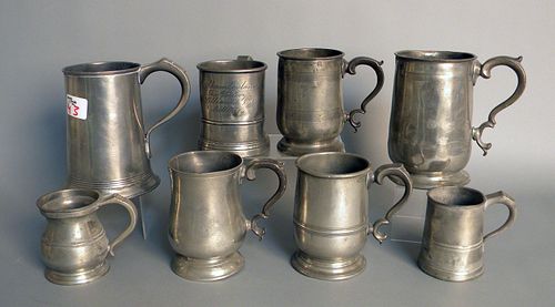 Eight English pewter measures, 19th c., tallest -/