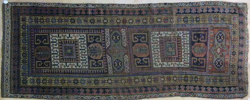 Kazak carpet, early 20th c., 9'3" x 3'6".