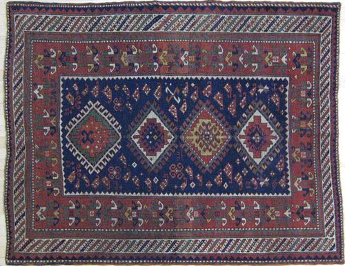 Kazak carpet, ca. 1900, with four medallions on al