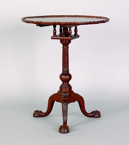 Chippendale style carved mahogany piecrust candles