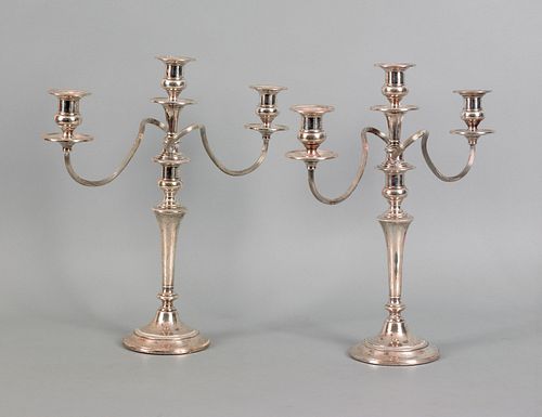 Pair of sterling silver weighted candelabra, ca. 1