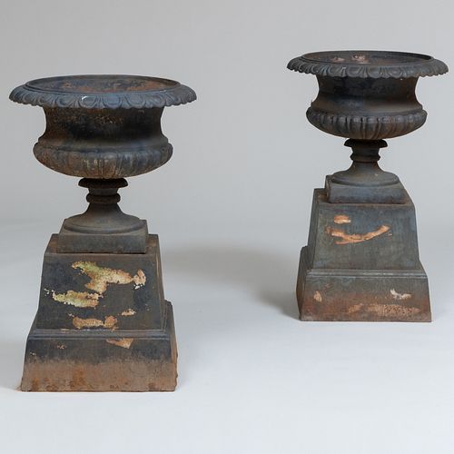 Pair of Cast Iron Garden Urns On Pedestal Bases