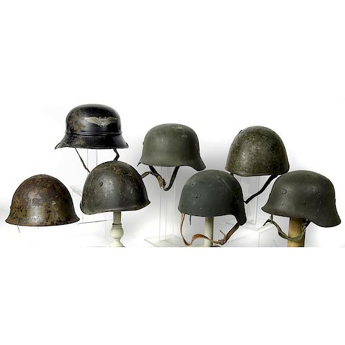 Lot of 7 World War II Axis Helmets