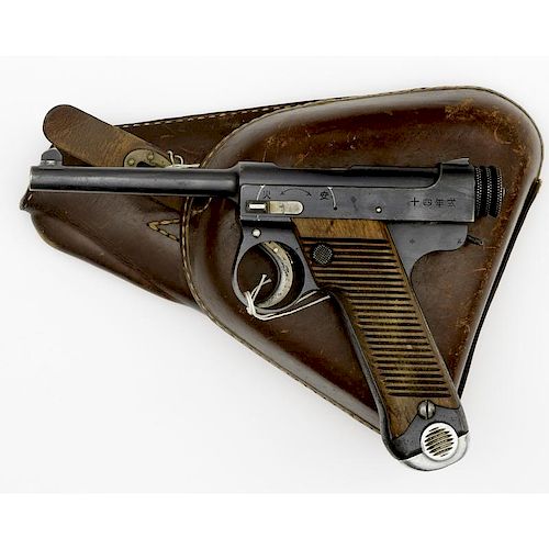**Early Japanese Type 14 Nambu Pistol and Leather Holster with Extra Magazine