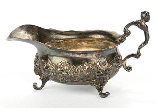 CHINESE EXPORT ATTRIBUTED HUNTING-THEMED SILVER SAUCE BOAT