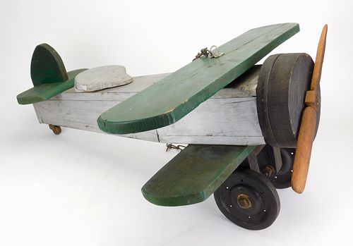 Large folk art carved wooden airplane