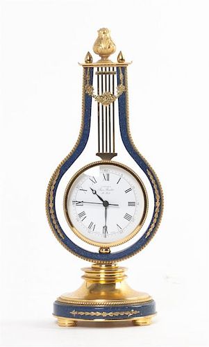A Gilt Metal and Faux Lapis Desk Clock, Height 9 3/4 inches.