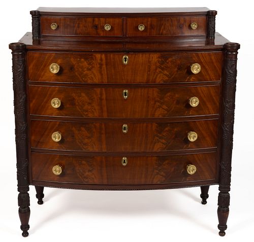 SALEM, MASSACHUSETTS LATE FEDERAL CARVED MAHOGANY BOW-FRONT CHEST OF DRAWERS, SCHOOL OF SAMUEL MCINTIRE