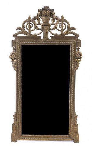 A Louis XVI Style Giltwood Mirror, Height 53 x width 26 3/4 inches.