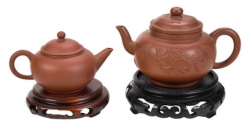 Two Miniature Lidded Clay Teapots with Stands