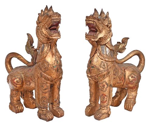 Pair of Thai Carved Giltwood and Polychromed Qilin