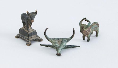 THREE ANCIENT BRONZES IN THE FORM OF BULLS