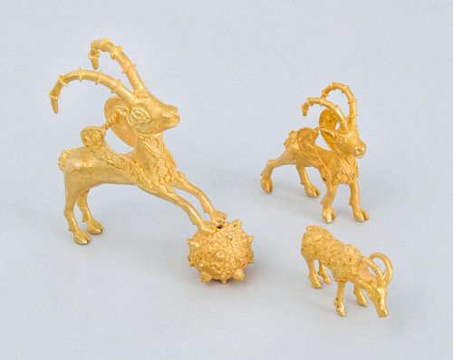 TWO 22K GOLD ACHAEMENID STYLE WINGED STAG PENDANTS, AFTER THE ANTIQUE