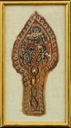 COPTIC TEXTILE WITH A THYRSOS-SHAPED PANEL WITH BACCHIC DANCERS