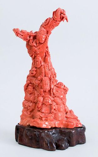 CHINESE CARVED CORAL GROUP OF SEVEN TIERED FIGURES