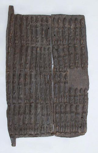 AFRICAN RELIEF-CARVED TWO-PLANK GRANARY DOOR PANEL