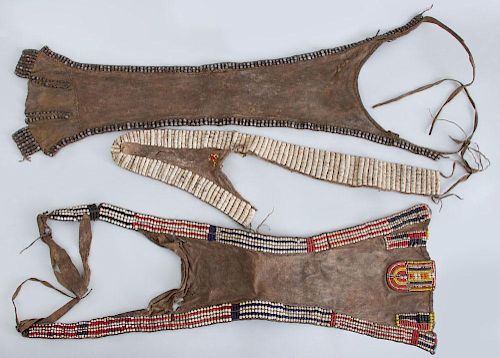THREE AFRICAN BEADED HYDE APRONS, CACHE SEXE
