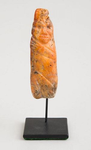 OCEANIC CARVED STONE FIGURE