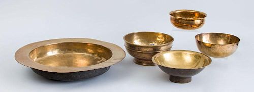 CONTINENTAL BRASS BROAD-RIMMED BASIN AND FOUR OTHER BRASS BOWLS