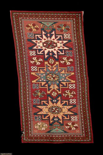 EMBROIDERED COPY OF CAUCASIAN RUG, EARLY- MID 20TH C