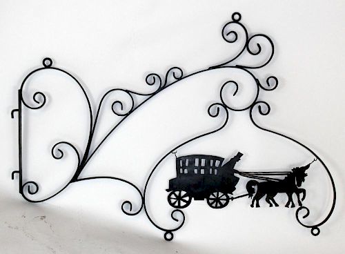 Wrought iron bracket with horse & carriage