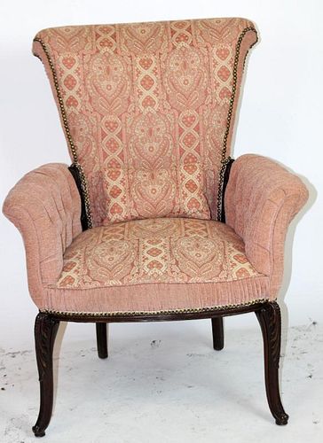 Antique arm chair with flared arms